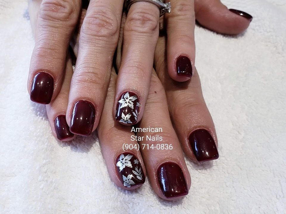 Close-up of painted nails and clean hands.